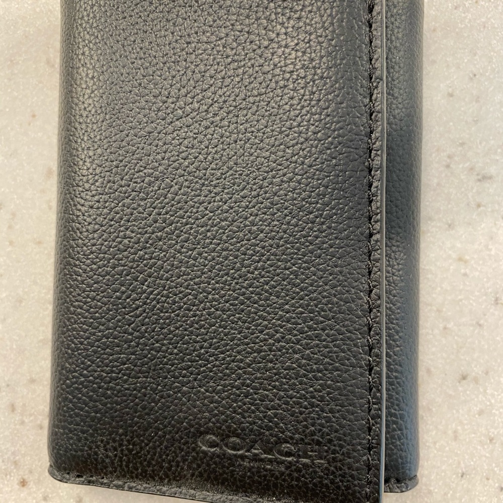 Men’s Coach wallet. Brand new with tags.